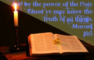 Book of Mormon and candle with scripture quote from Moroni.